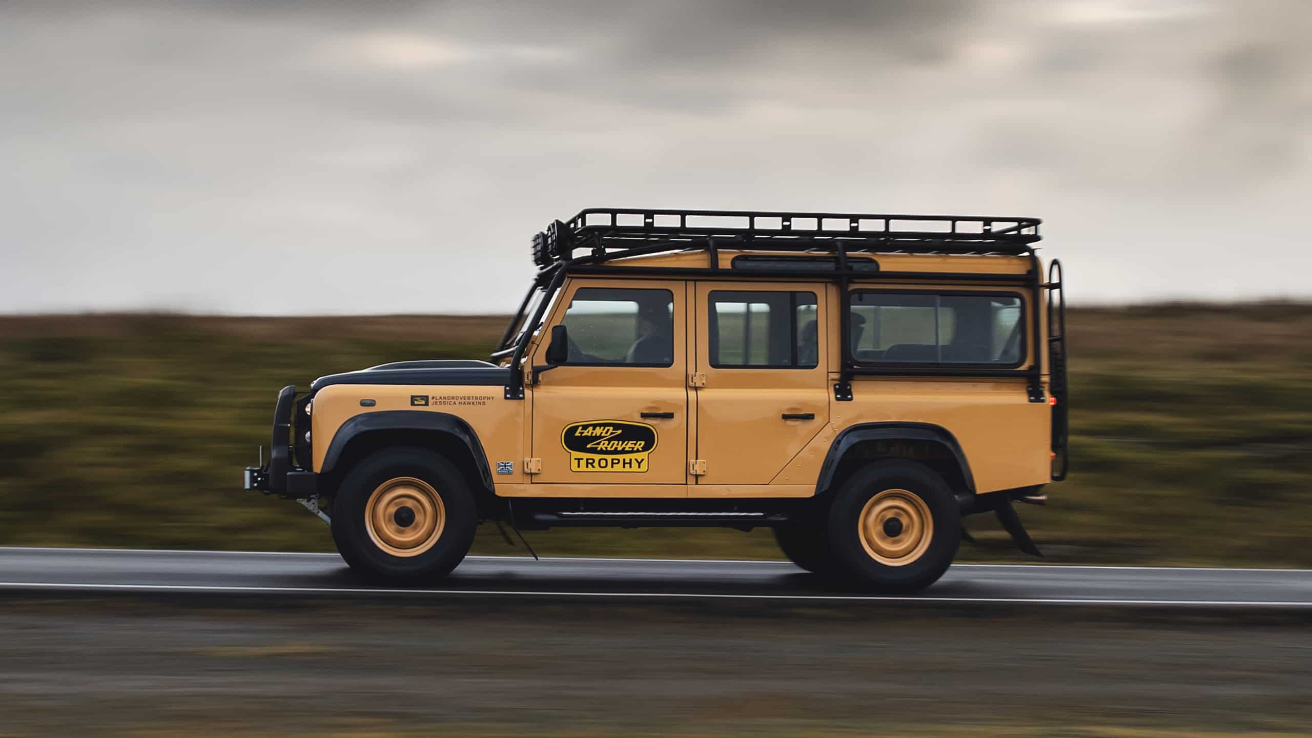 Landrover Defender classic Trophy running on road