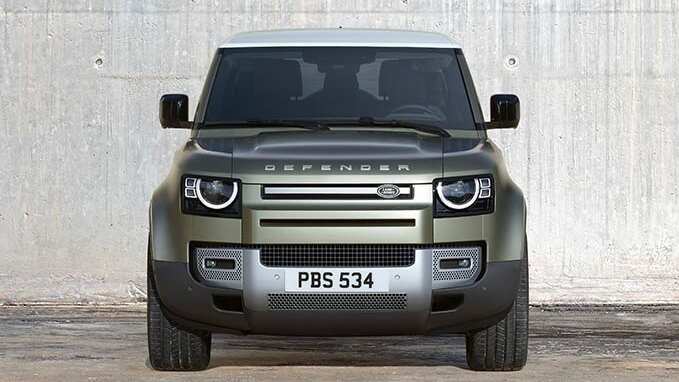 Land Rover Defender in white front view