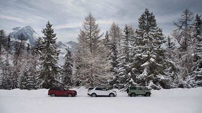 Land Rover vehicles in snow