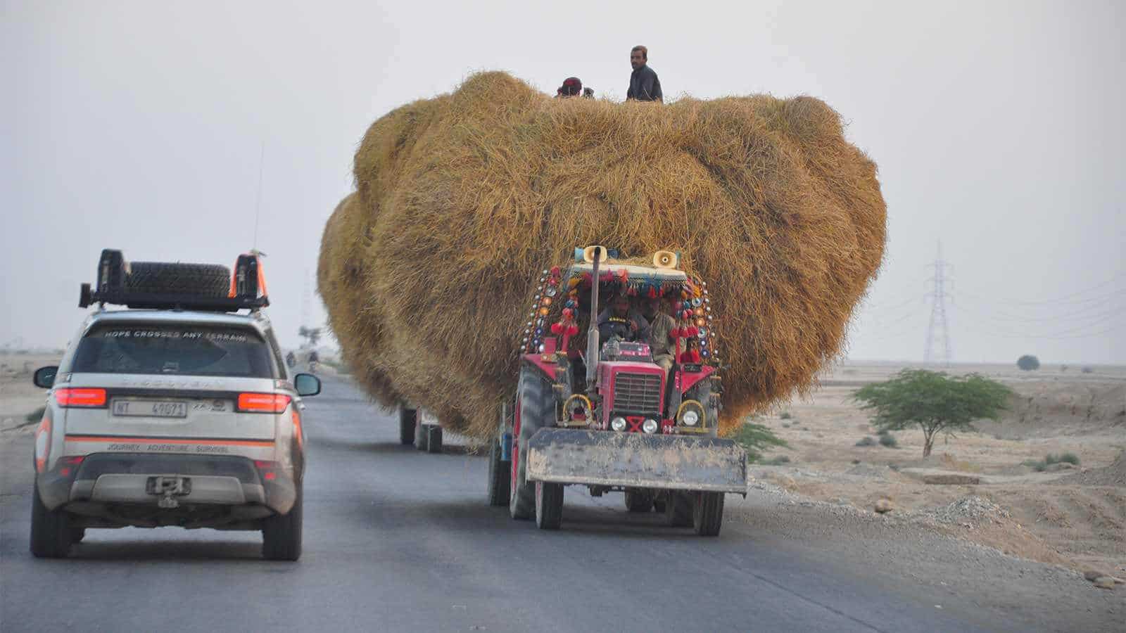 A truck carrying hay